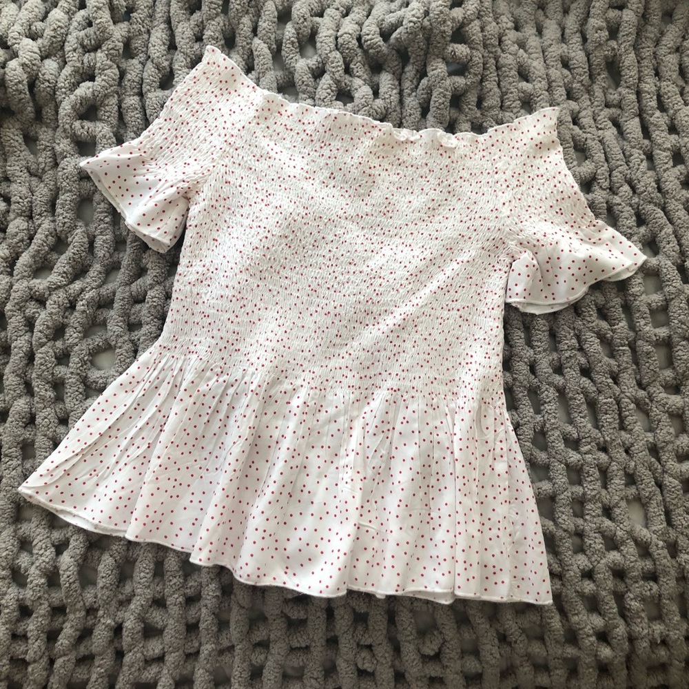 Red polka dot off the shoulder shirt